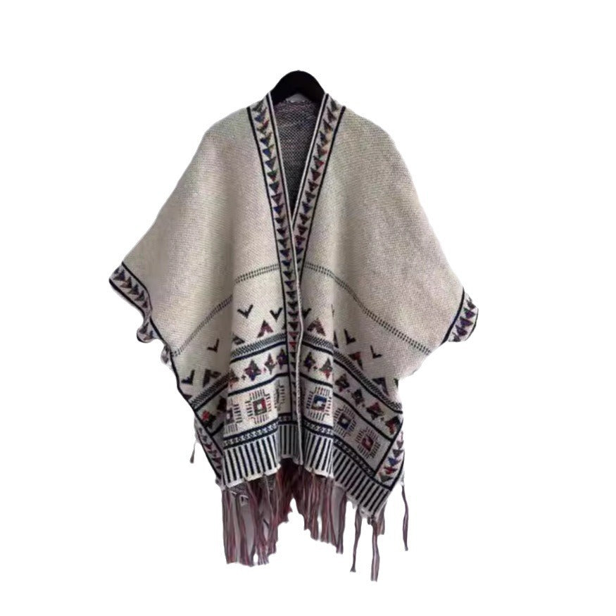 Damen Strickponcho mit Fransen und buntem Muster