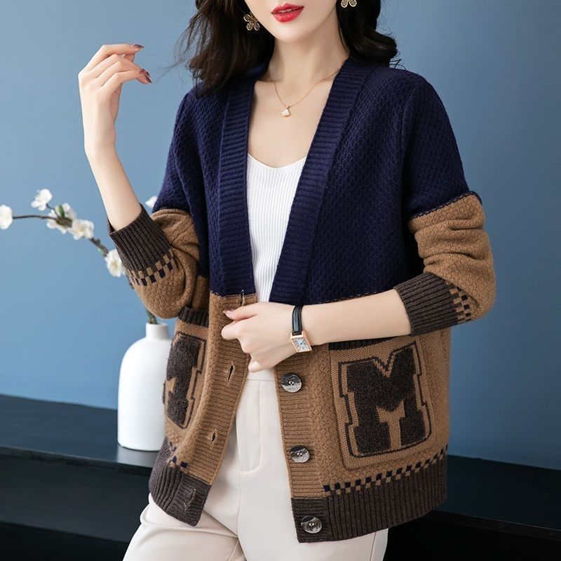 Damen Strickjacke mit Zopfmuster und Taschen