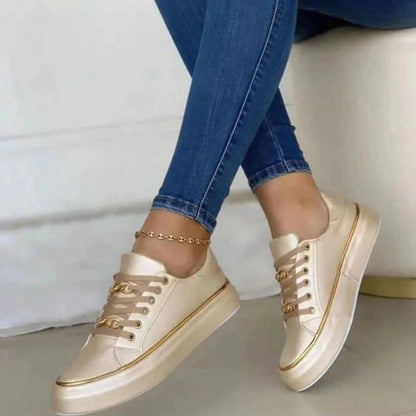 Damen Sneaker Weiß mit goldenen Akzenten und Schnürung