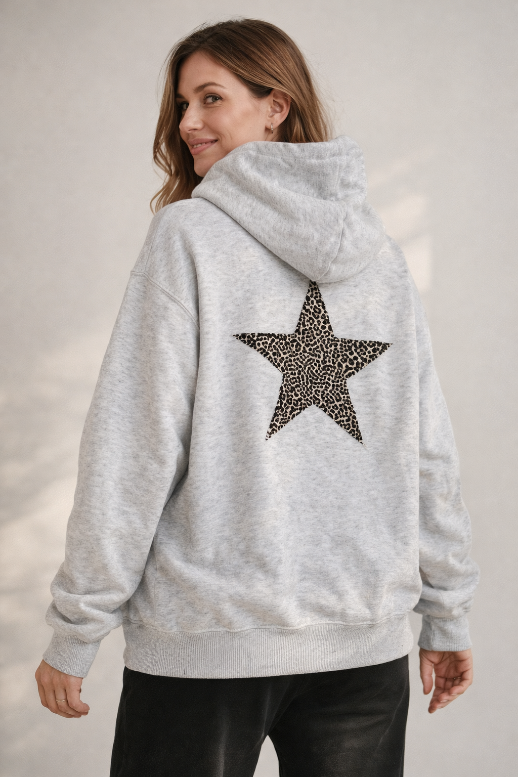 Damen Hoodie Leoprint Sternmotiv Eveloria - Eveloria