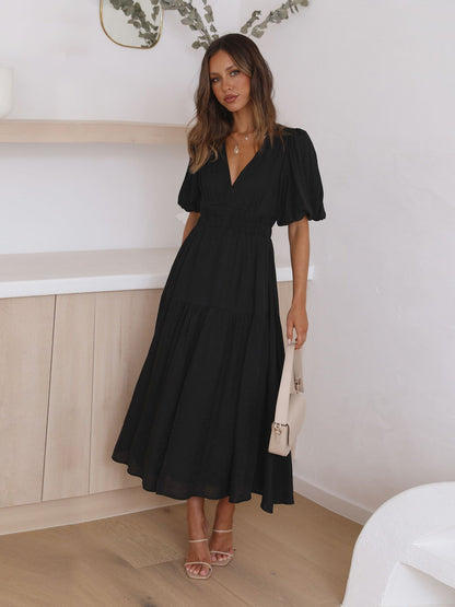 Damen Maxikleid V-Ausschnitt Puffärmel Eveloria