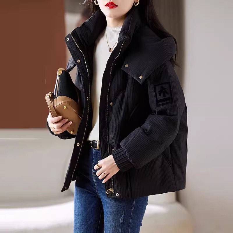 Damen Oversized Steppjacke mit Kapuze und praktischem Design