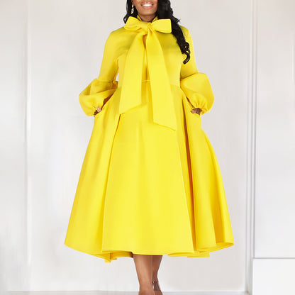 Damen Midi-Kleid Länge Knie, lange Puffärmel, elegante Schleife