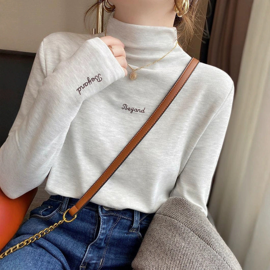 Damen Turtleneck-Pullover Eveloria mit Schriftzug - Eveloria