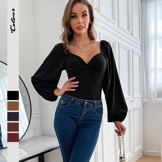 Damen Body mit Puffärmeln und Knopfdetail - Eveloria