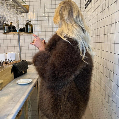Damen Kunstpelzjacke Voluminöse Ärmel Eveloria