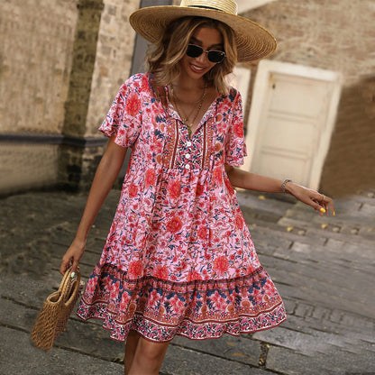 Damen Blumenkleid Sommer Rüschensaum Knopfdesign