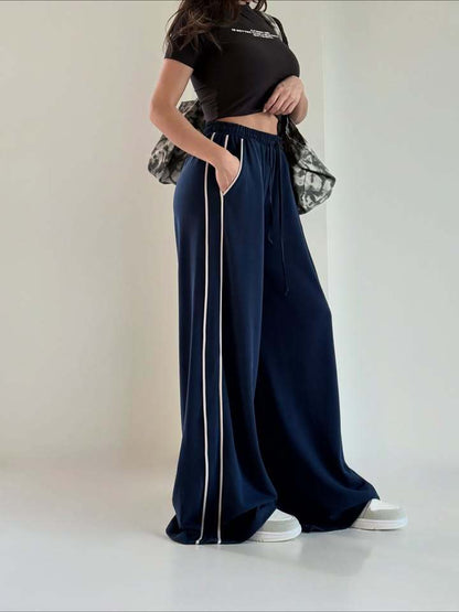 Damen Sporthose Weit Elastischer Bund Seitentaschen Eveloria