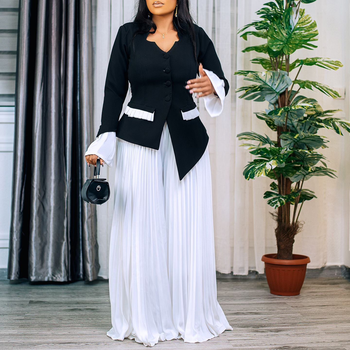 Damen Jumpsuit Tailliert Plissee Eveloria