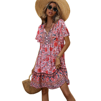 Damen Blumenkleid Sommer Rüschensaum Knopfdesign