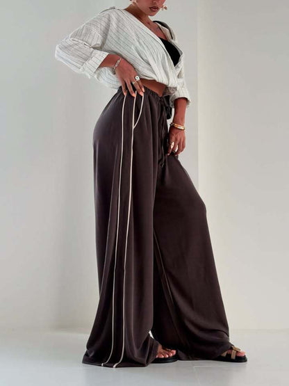 Damen Sporthose Weit Elastischer Bund Seitentaschen Eveloria