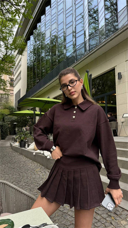 Damen Polo- mit Faltenrock und Knopfverschluss Weiß