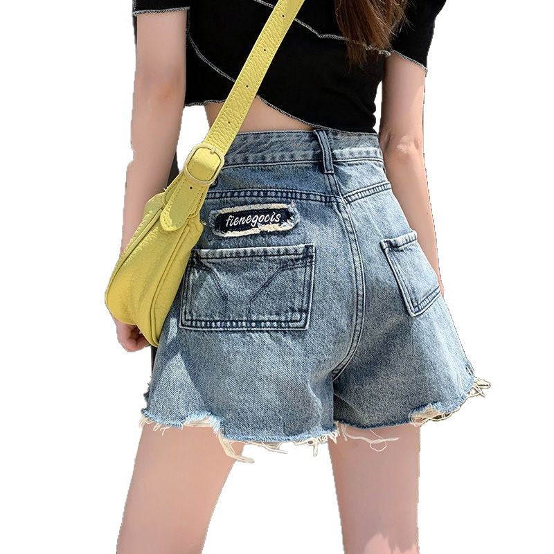 Damen Jeansshorts Fransensäume Stickdetail Blau Eveloria