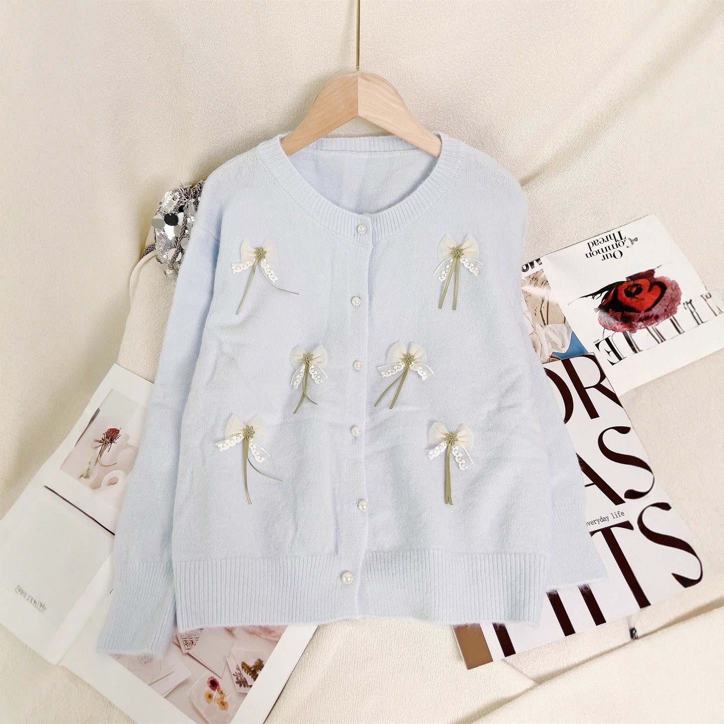 Damen Strickjacke mit Schleifen-Applikationen Eveloria - Eveloria