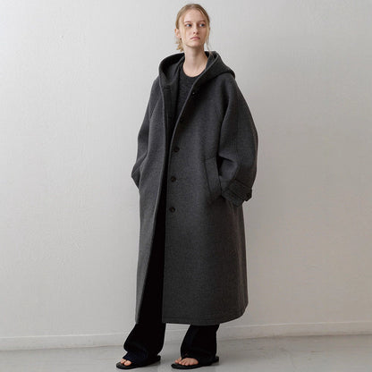 Damen Oversize-Mantel mit Kapuze und Taschen Schwarz Eveloria - Eveloria