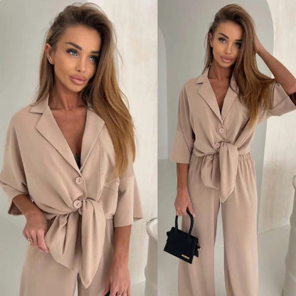 Damen Jumpsuit mit Bindegürtel und weiten Beinen Eveloria