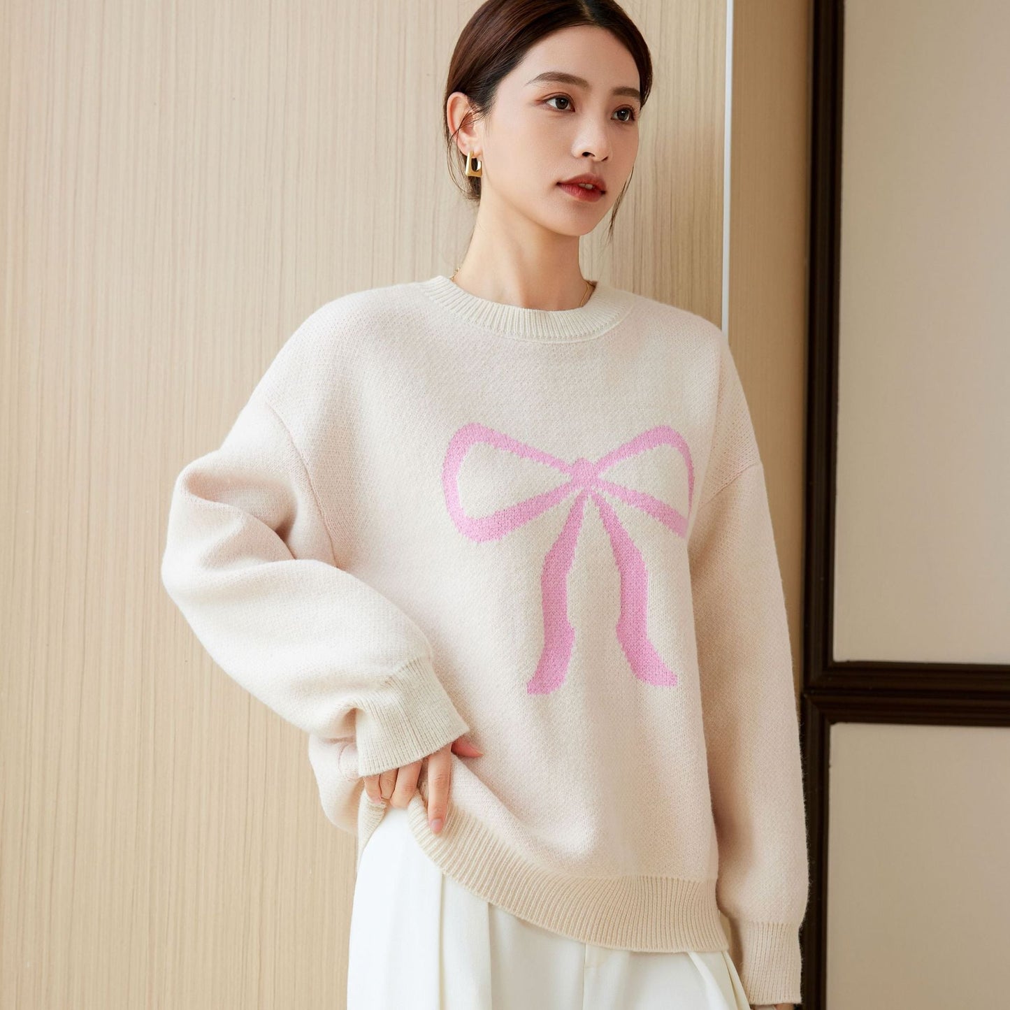 Damen Oversized Pullover Schleifenmotiv Eveloria