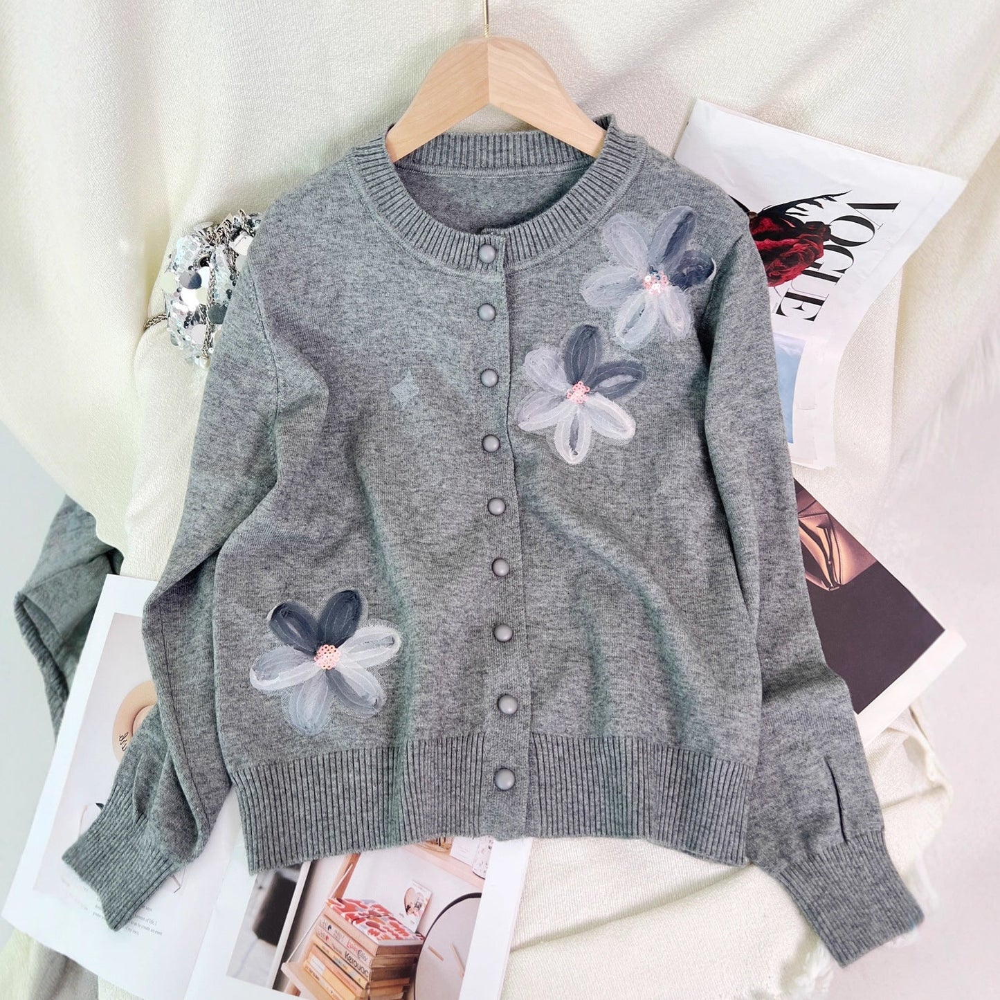 Damen Strickjacke Floralmuster Knopfverschluss Eveloria