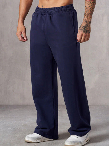 Herren Baggy Jogginghose Elastisch Seitentaschen Eveloria