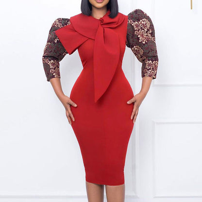 Damen Kleid mit Statement-Kragen und floralem Ärmel Eveloria