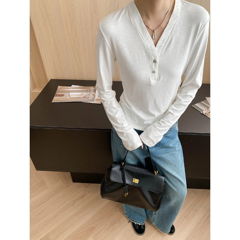 Damen Langarmshirt mit Knöpfen und lockerem Schnitt Eveloria