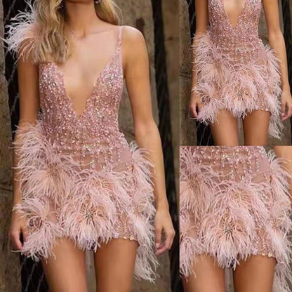 Damen Party-Kleid mit Paillettenbesatz und Federn Eveloria