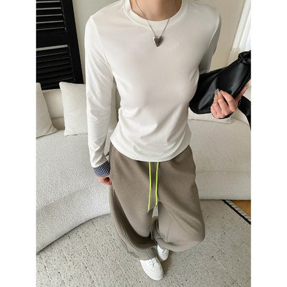 Damen Langarmshirt Feine Rippstruktur Modisches Detail Weiße Farbe