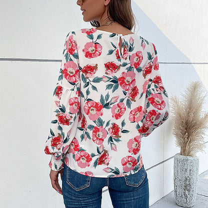 Damen Bluse mit Volumenärmel Floralmuster Eveloria