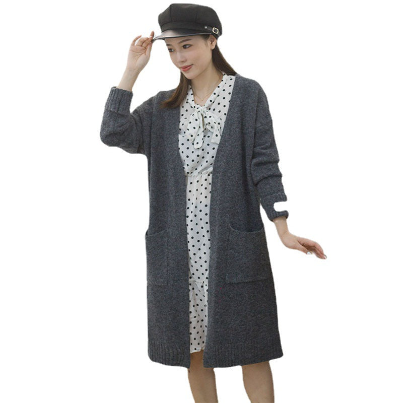 Damen Oversize Strickjacke mit Taschen Eveloria