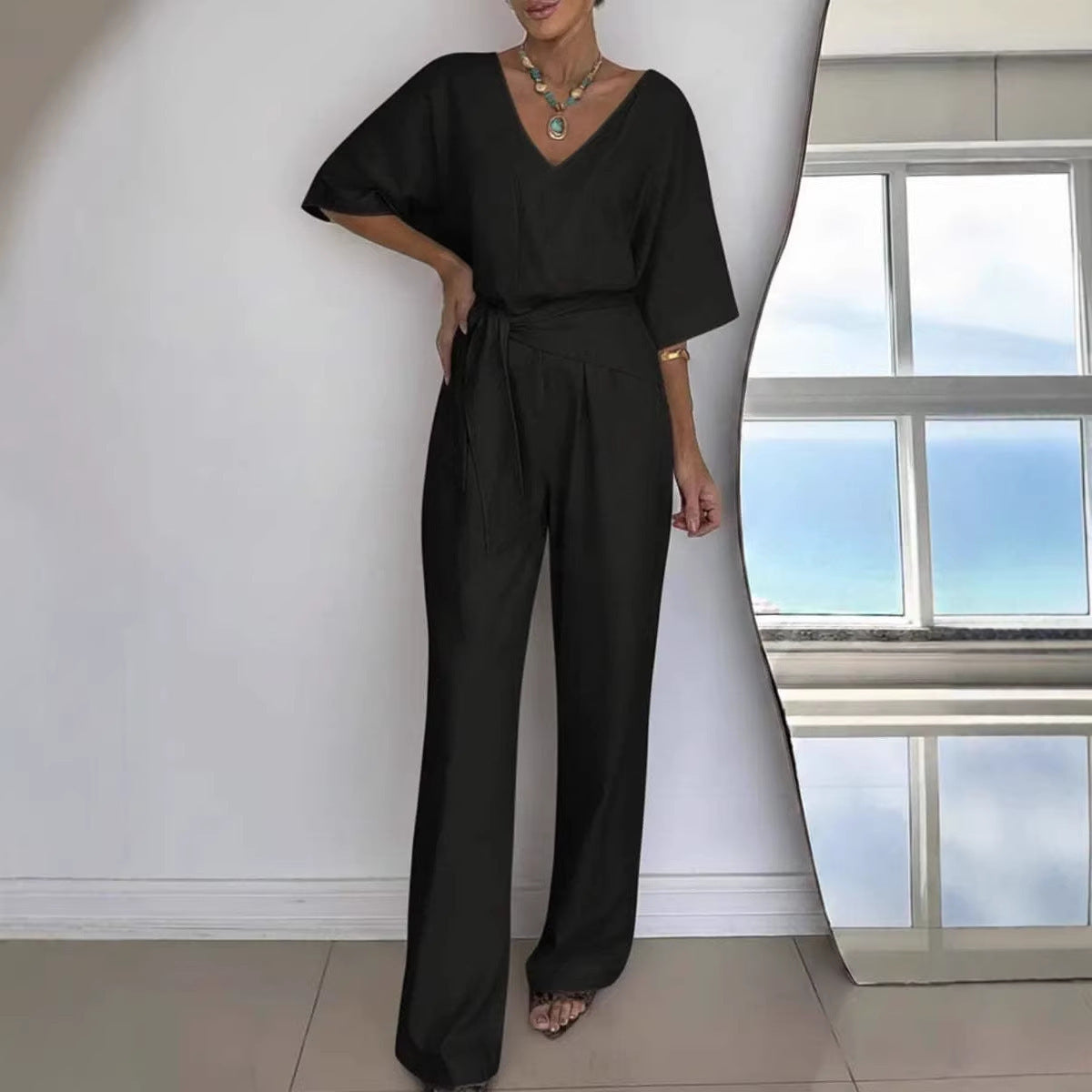 Damen Jumpsuit Tailliert Wickelgürtel Eveloria