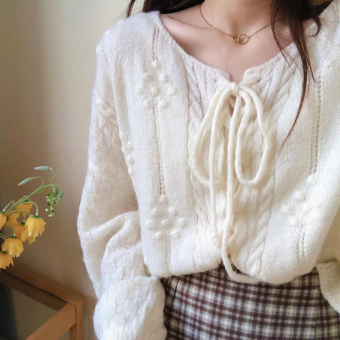 Damen Pullover mit Bändchen und Struktur Muster Eveloria - Eveloria
