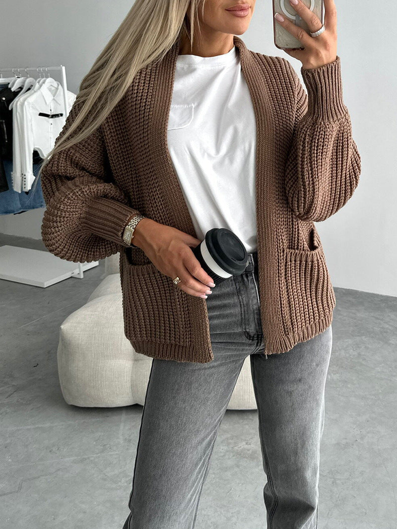 Damen Strickjacke Voluminöse Ärmel Taschen Eveloria