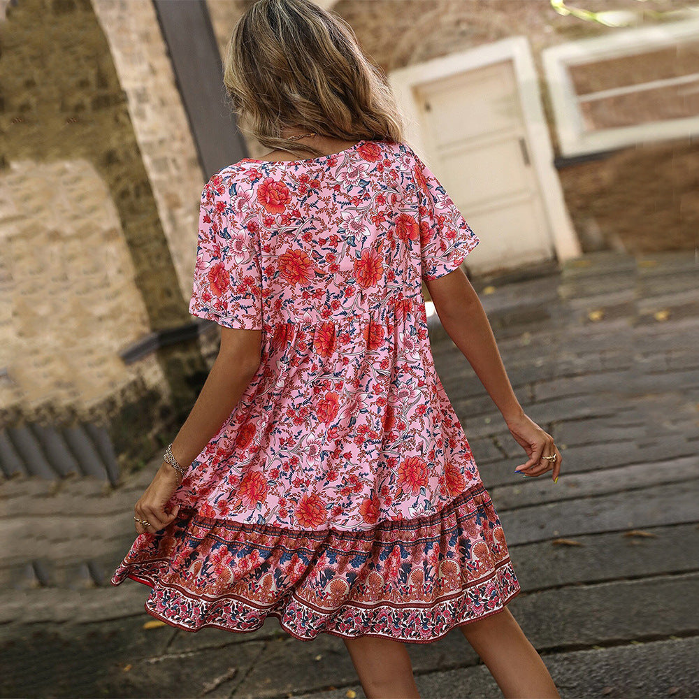 Damen Blumenkleid Sommer Rüschensaum Knopfdesign