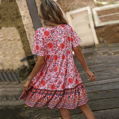 Damen Blumenkleid Sommer Rüschensaum Knopfdesign