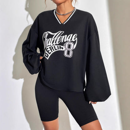 Damen Oversized Sweatshirt V-Ausschnitt Grafikprint Eveloria