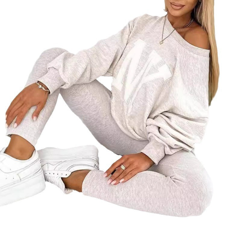 Damen Oversized Pullover mit floralem Logo und passender Leggings