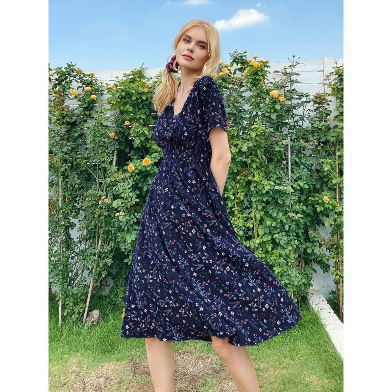 Damen Midi-Kleid Floralmuster Schwingender Saum Eveloria