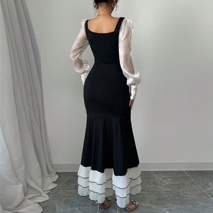Damen Maxikleid mit Puffärmeln und Rüschensaum Eveloria
