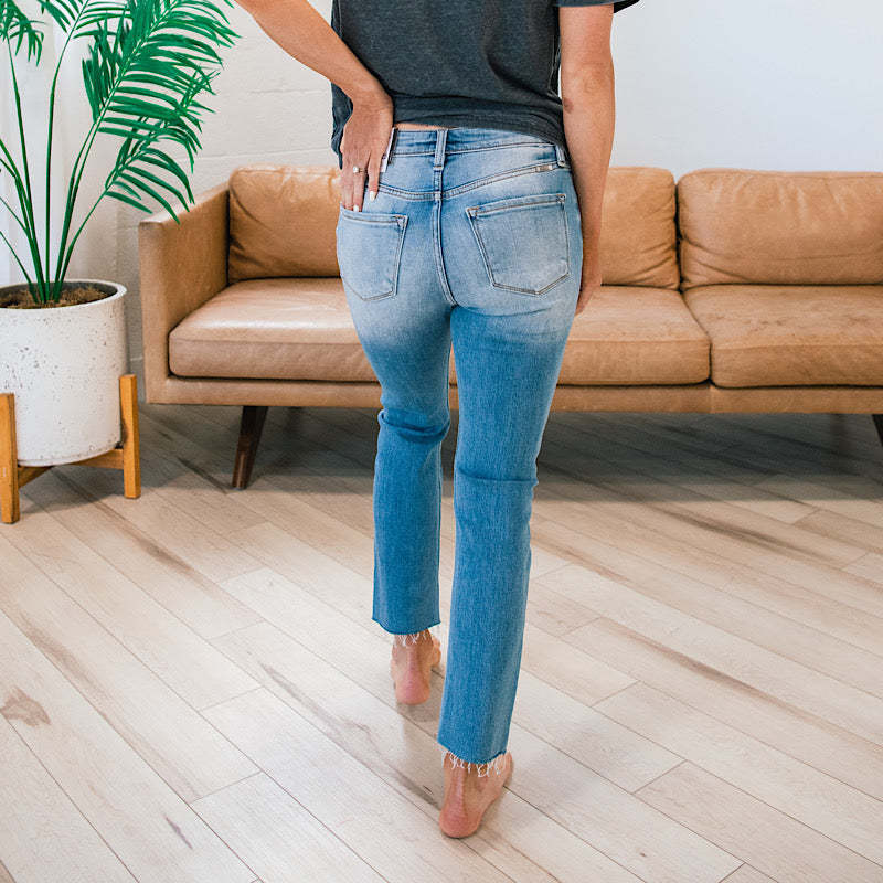 Damen High-Waist Jeans Knöpfeinsatz Fransensaum Eveloria