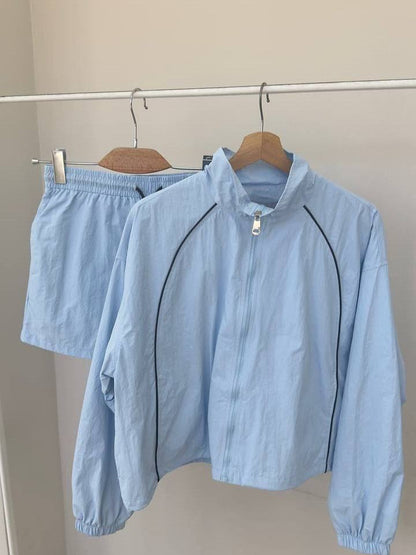 Damen Sportset Windbreaker-Oberteil und Shorts Eveloria