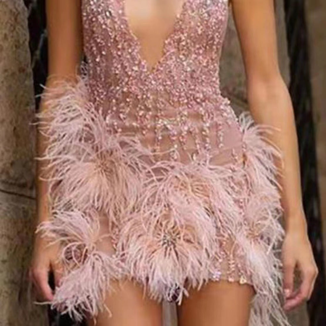 Damen Party-Kleid mit Paillettenbesatz und Federn Eveloria