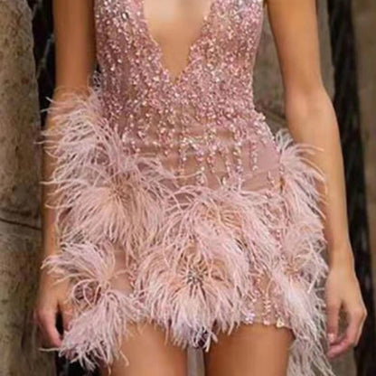 Damen Party-Kleid mit Paillettenbesatz und Federn Eveloria