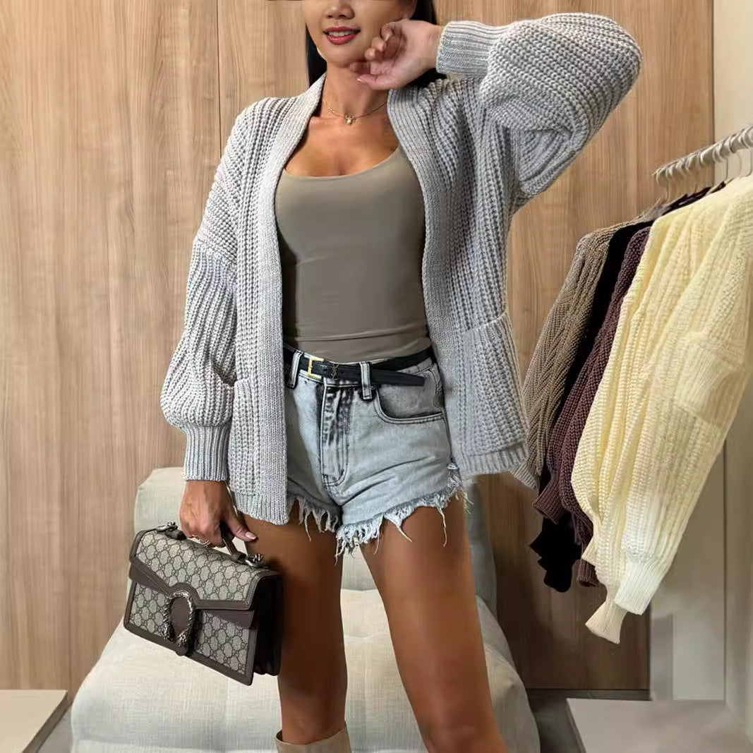 Damen Strickjacke Voluminöse Ärmel Taschen Eveloria