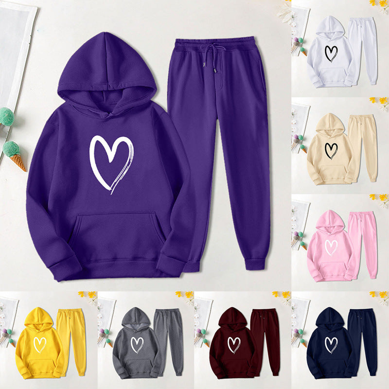 Damen Sweatsuit Kängurutasche Herzprint Eveloria