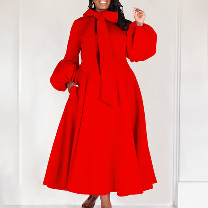 Damen Midi-Kleid Länge Knie, lange Puffärmel, elegante Schleife