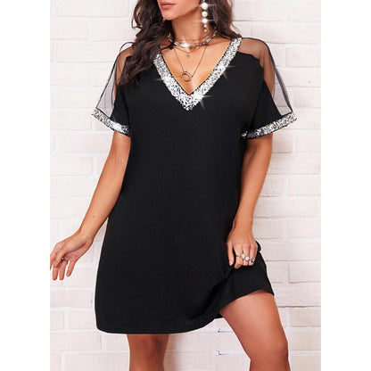 Damen Kleid mit transparenten Ärmeln Glitzerdetails Eveloria - Eveloria
