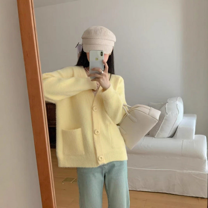 Damen Flauschiger Cardigan mit Knöpfen und Taschen Eveloria - Eveloria