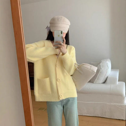 Damen Flauschiger Cardigan mit Knöpfen und Taschen Eveloria - Eveloria