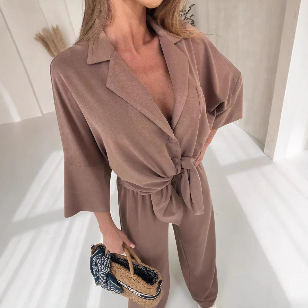 Damen Jumpsuit mit Bindegürtel und weiten Beinen Eveloria