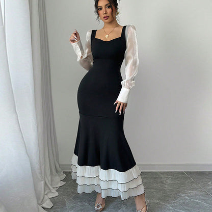 Damen Maxikleid mit Puffärmeln und Rüschensaum Eveloria - Eveloria